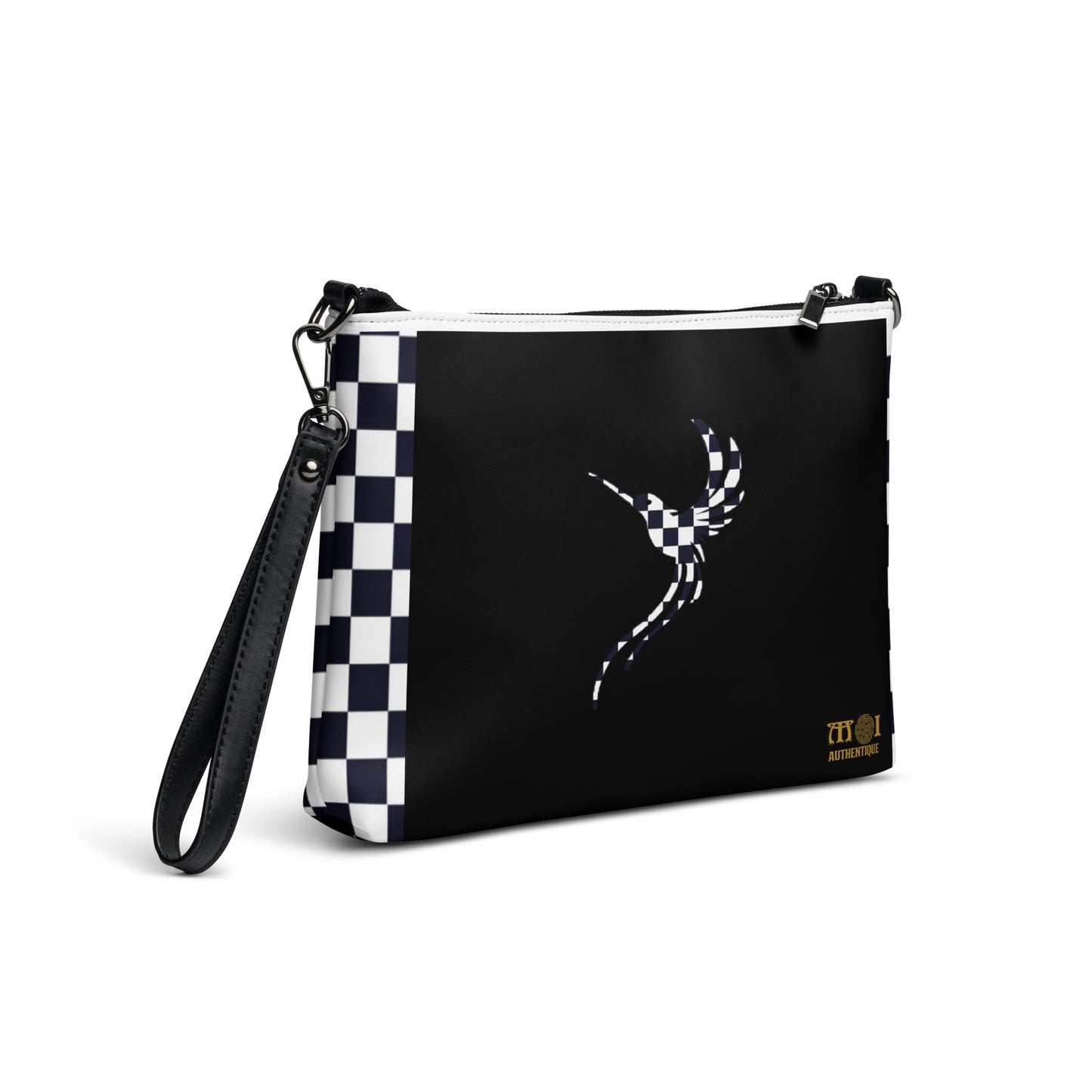 A black and white checkered faux leather crossbody bag