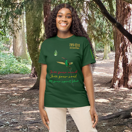 Woman wearing a green t-shirt with nature-themed design in a forest setting