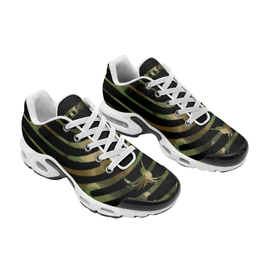 Pair of black and green striped sneakers with white laces on a white background