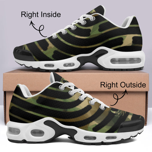 Camouflage-patterned sneakers with white soles on a gray background