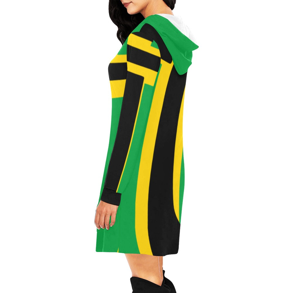Side view of a woman wearing a green, black and yellow dress on a white background.