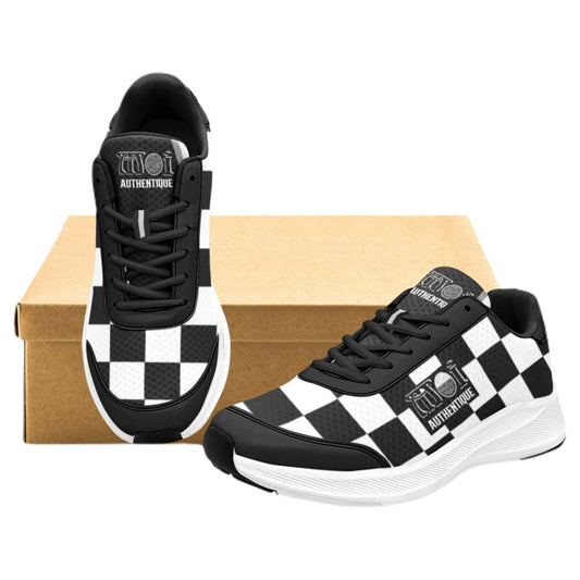 A pair of Moi Authentique Women's 2-Tone Skanking Sneakers with a black and white checkered design, displayed alongside a brown box.