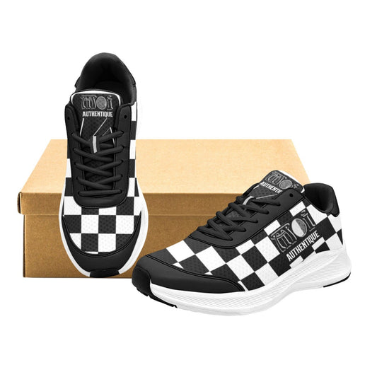 A pair of men's 2-tone skanking sneakers with a checkered pattern, displayed alongside a brown box, possibly for packaging.
