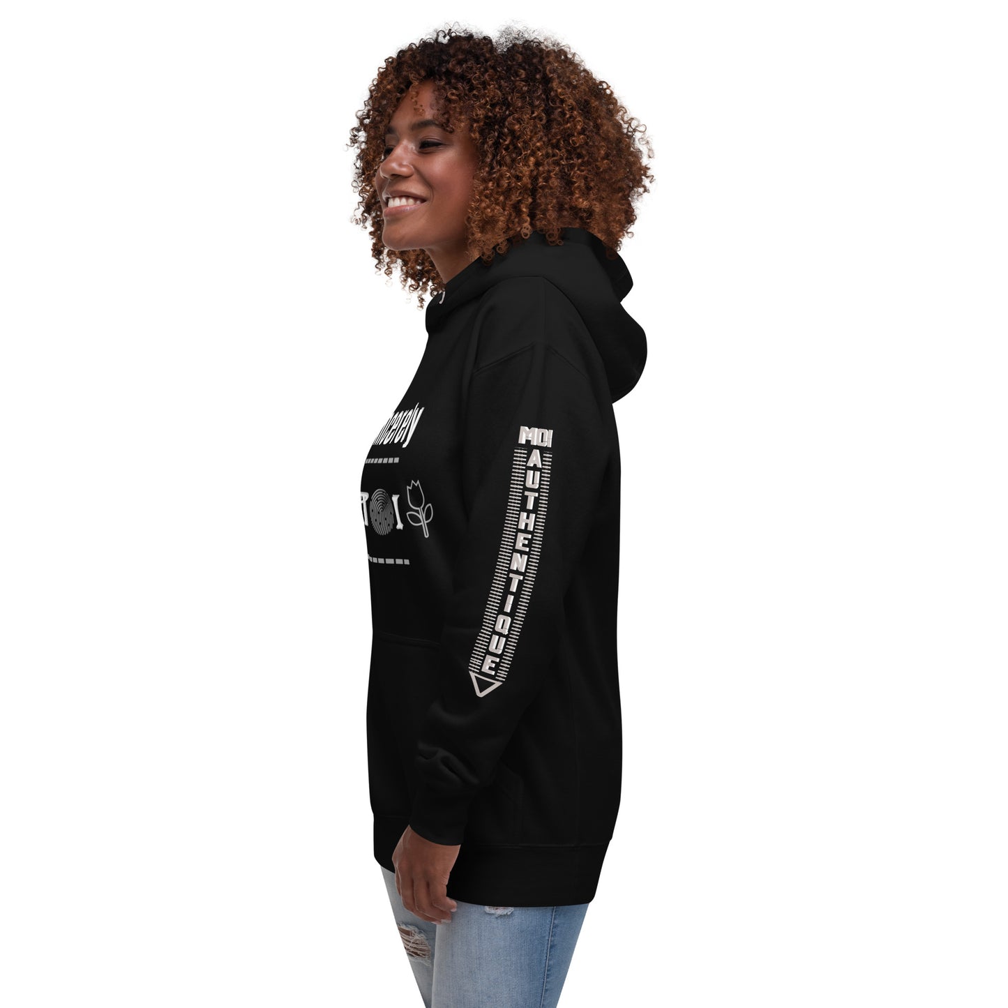 Side view of a woman wearing a black unisex hoodie with a front pouch pocket and drawstrings, standing against a white background.