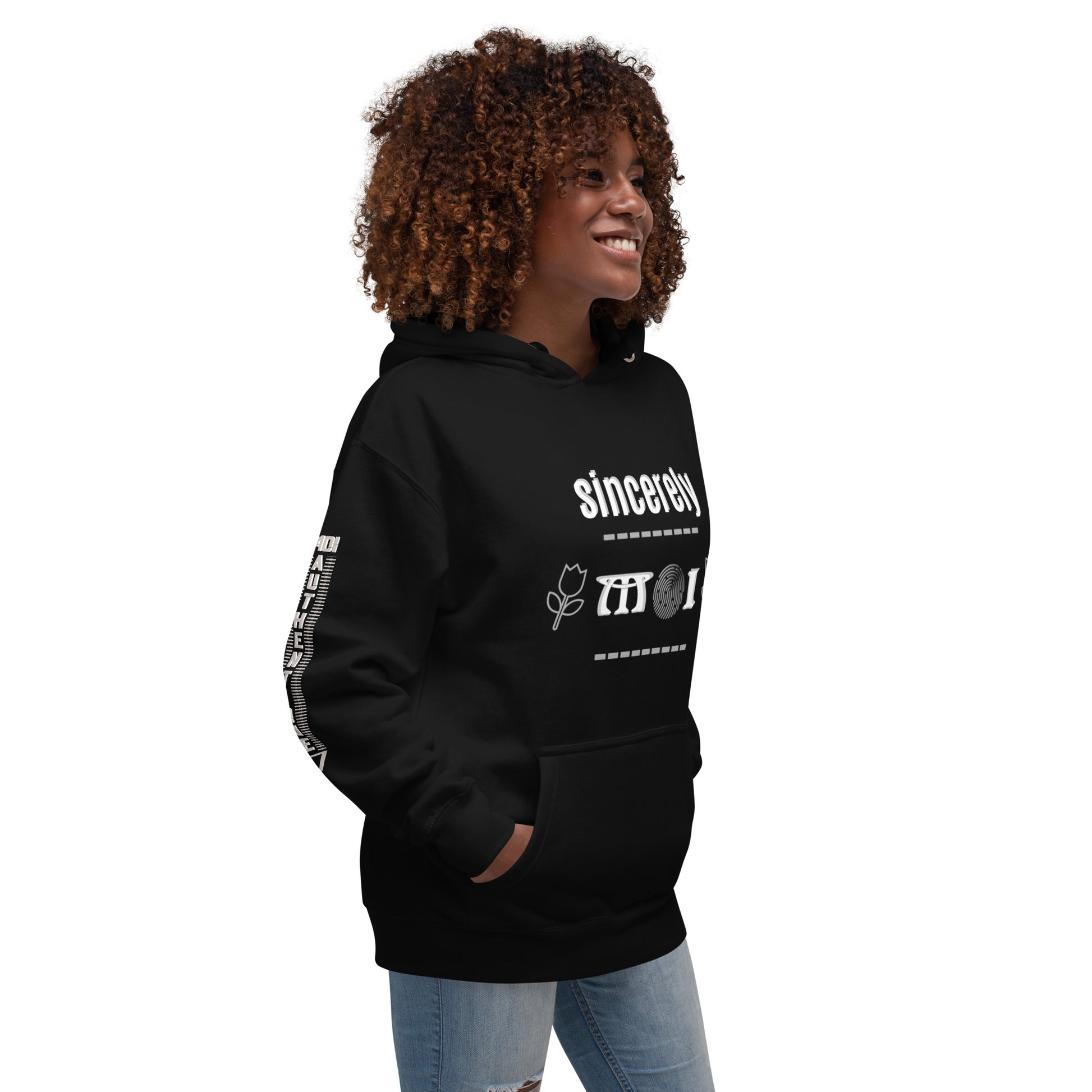 Side view of a woman wearing a black unisex hoodie with a front pouch pocket and drawstrings, standing against a white background.