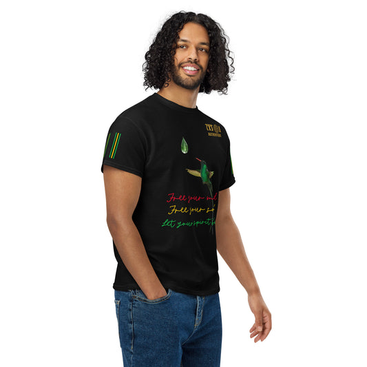 Side-on view of a smiling person with short hair wearing a black Unisex DryBlend T-Shirt with colourful text and graphics on it.
