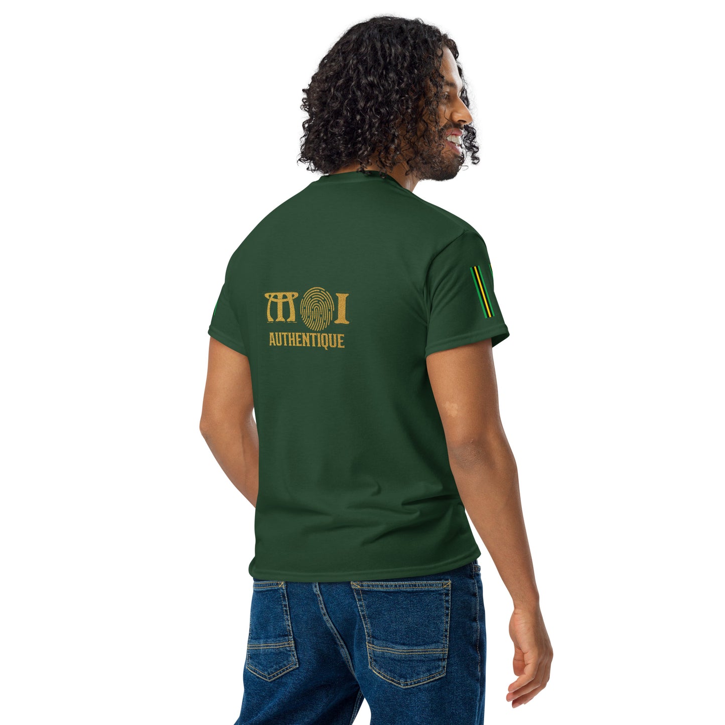 A man wearing a green t-shirt with the logo 'Moi Authentique' on the back
