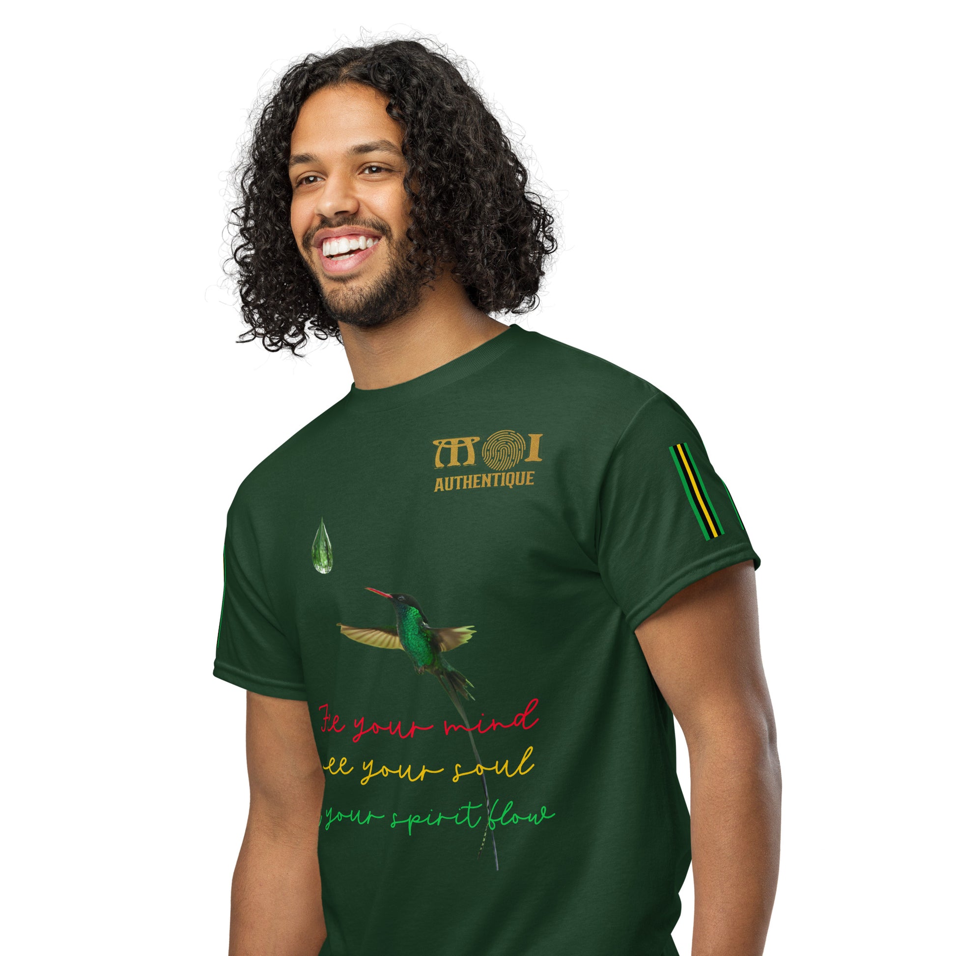 Side-on view of a smiling person with short hair wearing a green Unisex DryBlend T-Shirt with colourful text and graphics on it.