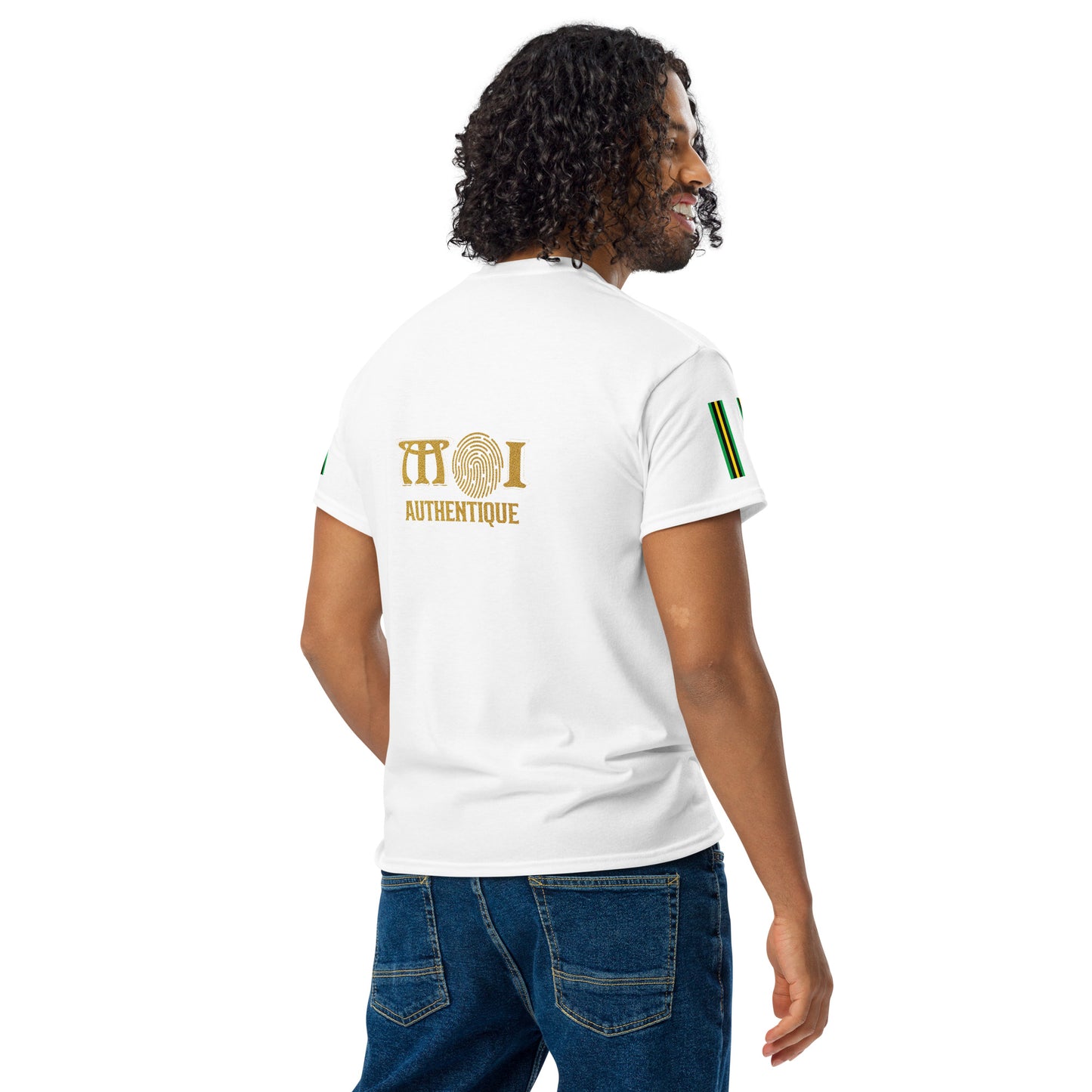 A man wearing a white t-shirt with the logo 'Moi Authentique' on the back