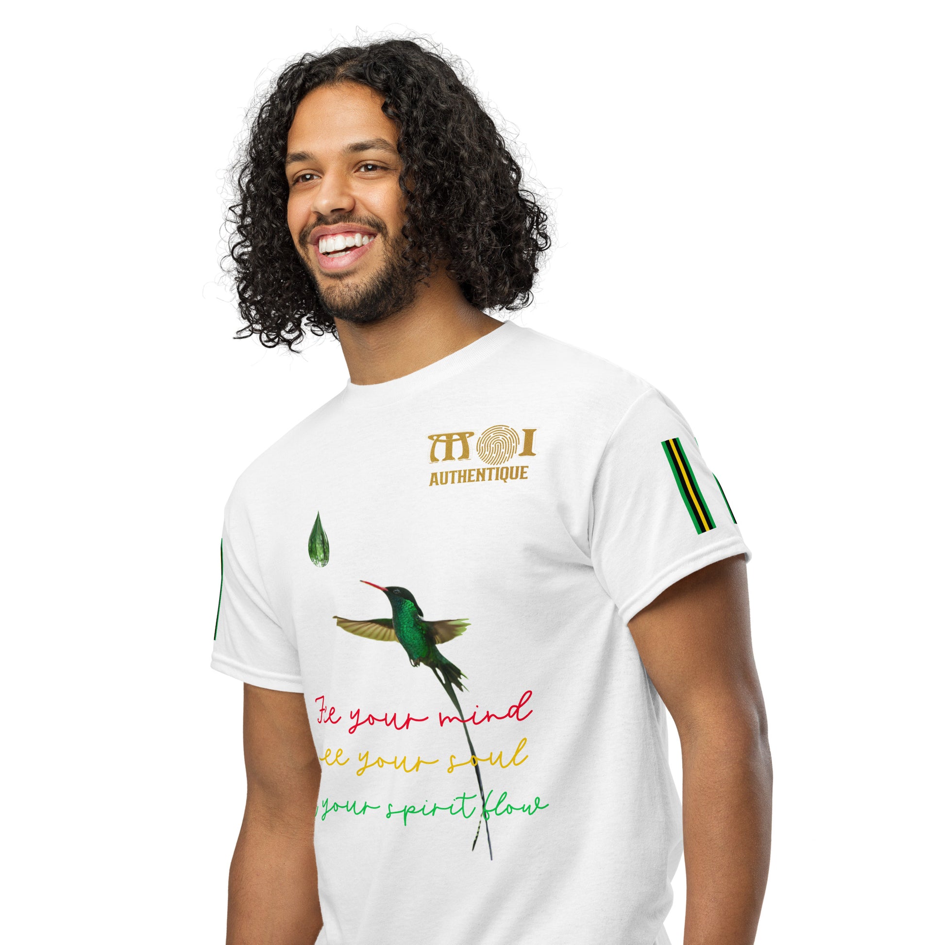 A smiling person with short hair wearing a white Unisex DryBlend T-Shirt with colourful text and graphics on it.